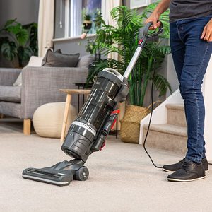 Russell Hobbs Hercules Upright Vacuum Cleaner in use.